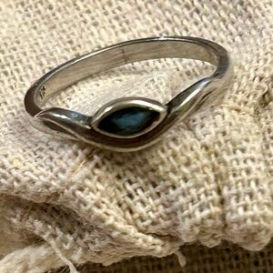 Silver 925 ring with blue gem.  Size is a little over 5.5.